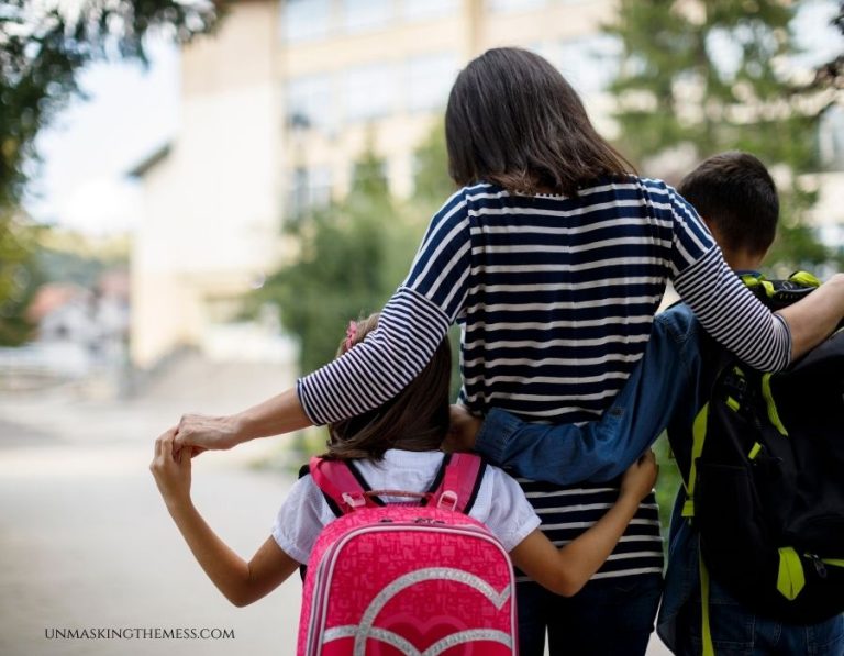 A mother walking her son and daughter to school with backpacks, symbolizing prayer and protection for back-to-school season