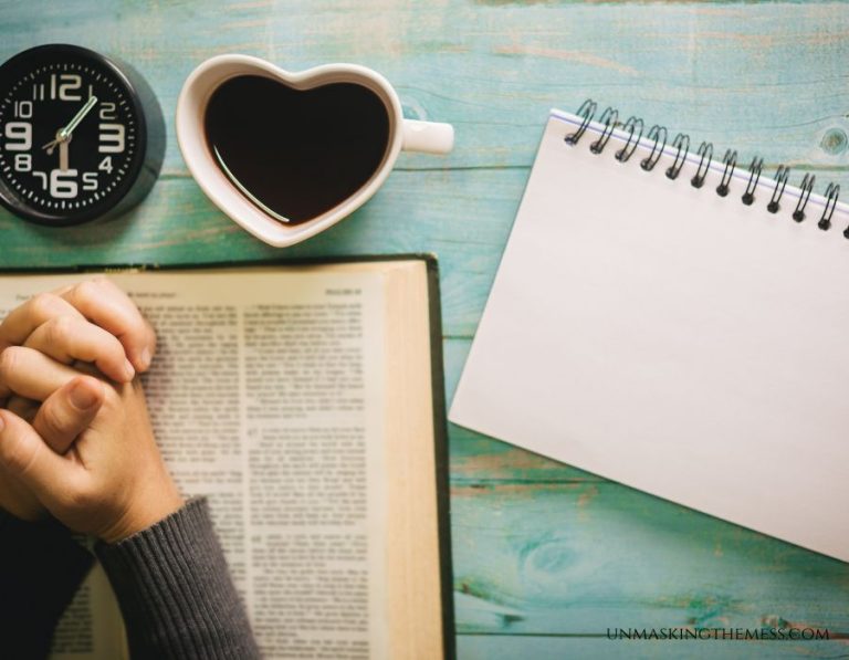 Christian woman sitting at the table with her Bible, mug of coffee, and her clock reflecting on God's Word infusing her with strength